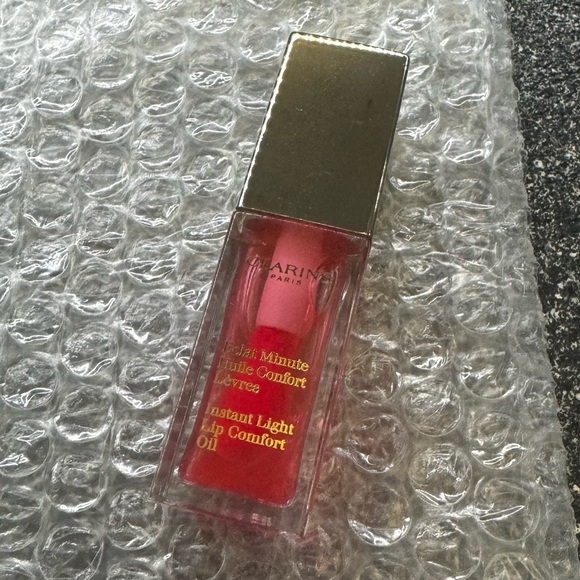 Clarins Instant Light Lip Comfort Oil Full Size Candy 7 ML / 0.1 OZ Swatched - Picture 1 of 3